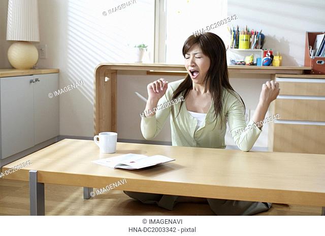 Woman Yawning