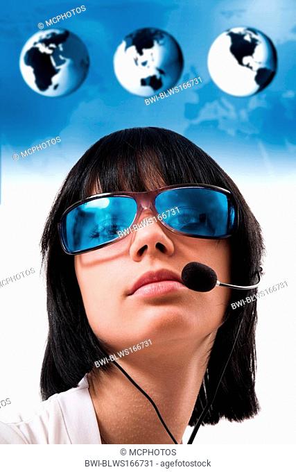 woman with blue sunglasses and headset