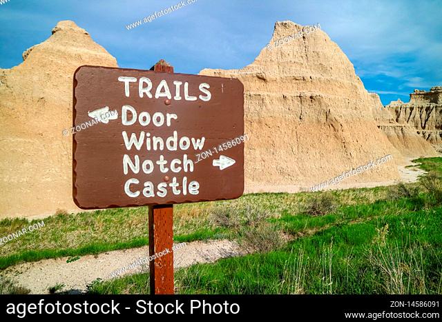 Badlands National Park, SD, USA - May 15, 2019: A signage post for different tourist destinations