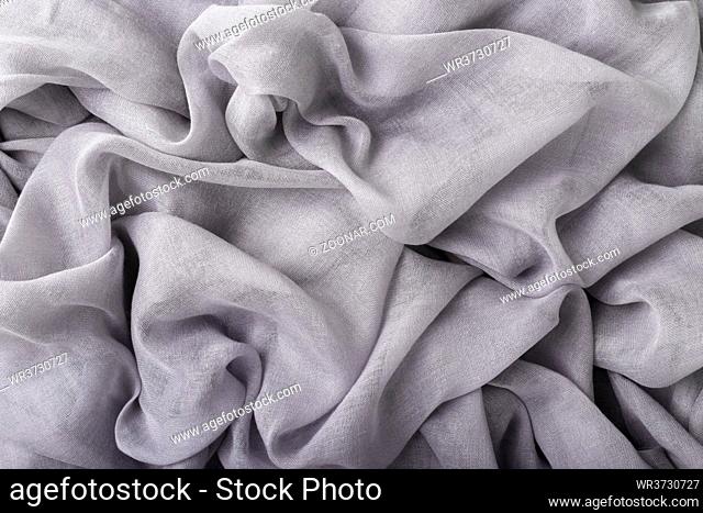 Soft grey crumpled cotton fabric close up