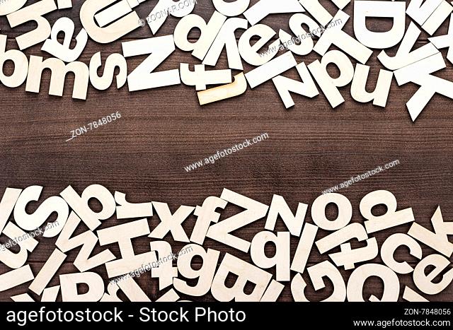uppercase and lowercase wooden letters background on the table