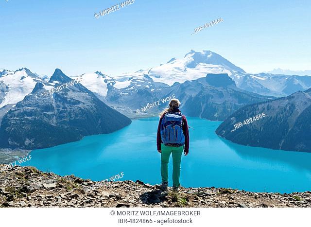View from Panorama Ridge Hiking Trail, Hiking on a Rock, Garibaldi Lake, Turkish Glacial Lake, Guard Mountain and Deception Peak, Glacier