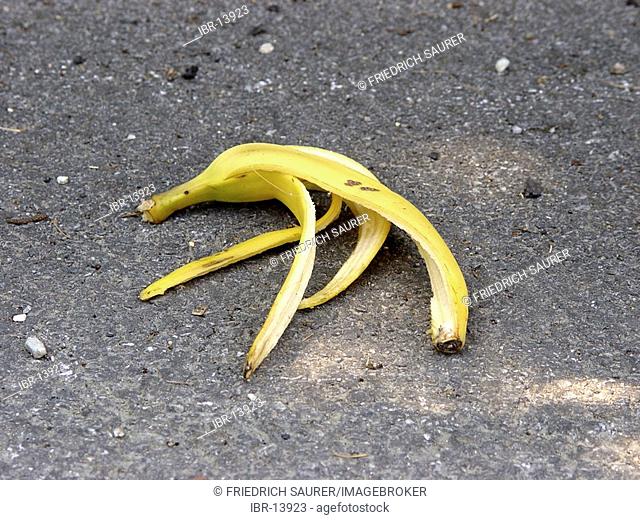 Banana skin on the road as symbol for slipping, falling down etc