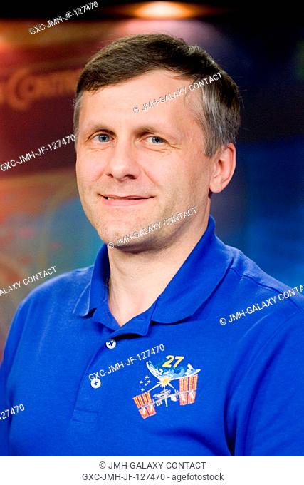 Russian cosmonaut Andrey Borisenko, Expedition 27 flight engineer and Expedition 28 commander, poses for a portrait following an Expedition 2728 preflight press...