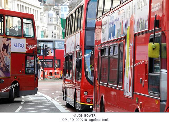 England, London, Piccadilly, Red double decker busses at Piccadilly Circus in London