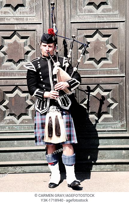 Scottish guy playing the bagpipes