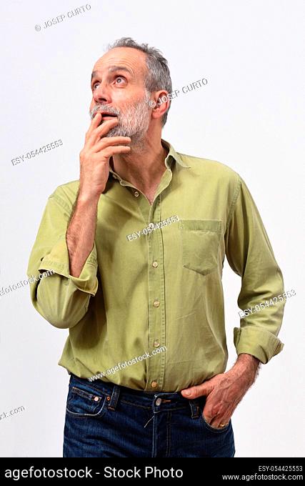 man having a doubt or question on white background