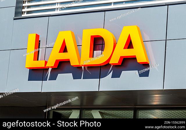 Samara, Russia - May 29, 2020: Dealership sign Lada on the office of official dealer. Lada is a Russian automobile manufacturer