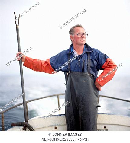 Man standing on boat