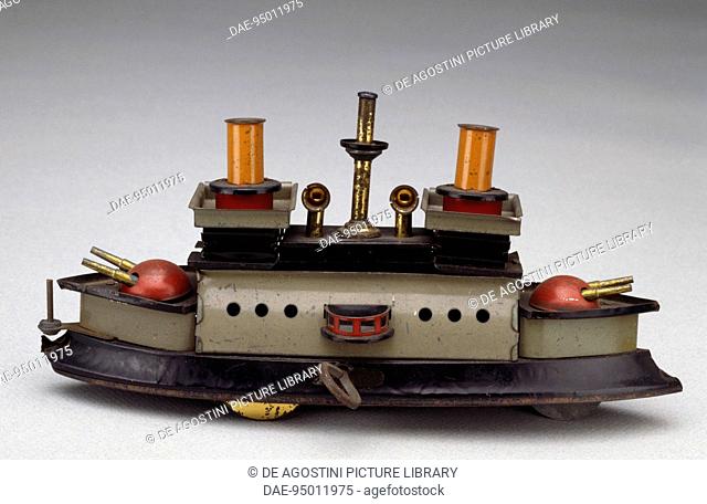 Coastal boat with cannons, painted tin toy, 1904. Germany, 20th century.  Milan, Museo Del Giocattolo E Del Bambino (Toys Museum)