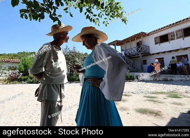 RUSSIA, SEVASTOPOL - AUGUST 27, 2023: Employees of the Genoese manor of the 15th century Loco Cimbali (recreated from ancient engravings and frescoes) are seen...