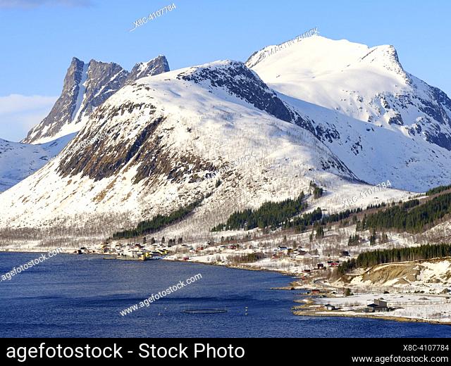 View over Bergsbotn, Bergsfjorden and Nordfjorden. The island Senja during winter in the north of Norway. Europe, Norway, Senja, March