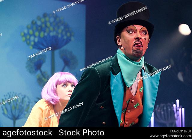 RUSSIA, MOSCOW - OCTOBER 13, 2023: Actress Alina Voskresenskaya as Thumbelina and actor Sergei Kolpovsky as Frog perform during a press preview of a production...