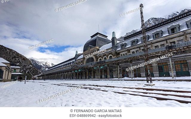 Abandoned old train station in Canfranc, in Spanish Pirineos mountain, near of the border of France. Photo taken in winter after a snowfall