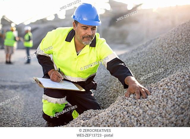 Quarry worker doing a quality check