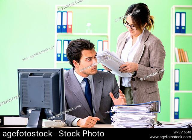 Man employee suffering from excessive work