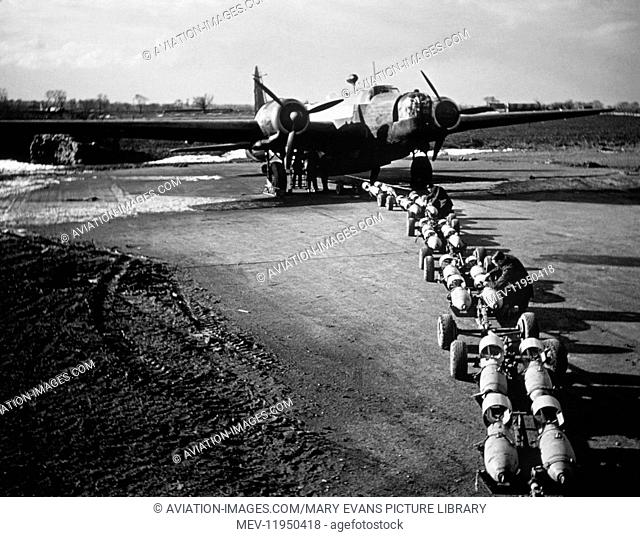 A 149 Sqn RAF Vickers Wellington Parked by a Row of Bombs to Be Loaded at Mildenhall, UK