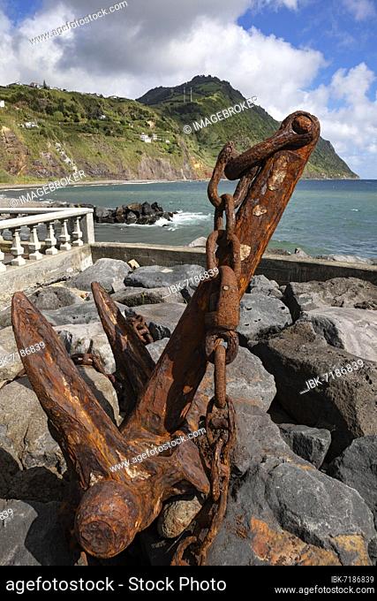 Old rusty anchor as a monument on the promenade, Povoacao, Sao Miguel Island, Azores, Portugal, Europe