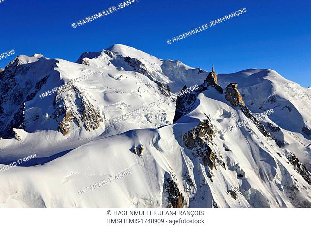 France, Haute Savoie, Chamonix Mont Blanc, Mont Blanc (4810m) and the Aguille du Midi (3842m) at sunrise
