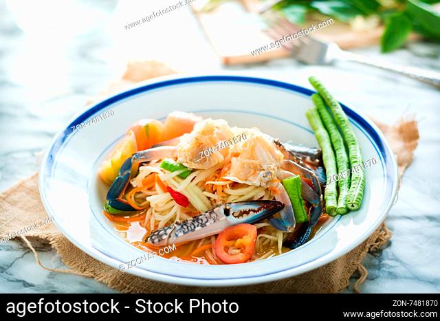 Thai food papaya salad with pickled Blue crab