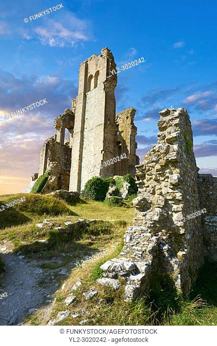 Medieval Corfe castle keep close up sunrise, built in 1086 by William the Conqueror, Dorset England