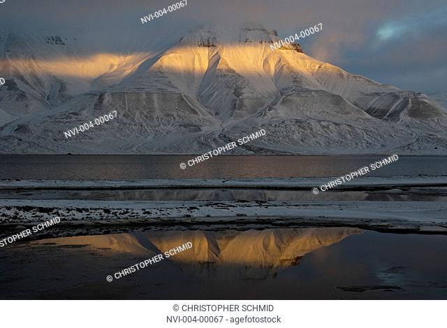 Massif of Adventdalen and Isfjorden at dusk, Spitsbergen, Norway, Europe