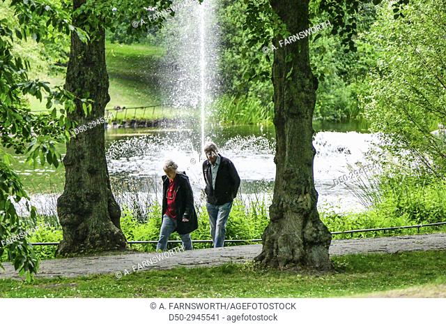 STOCKHOLM, SWEDEN Fruängen suburb. Långbro park. Elderly couple walking