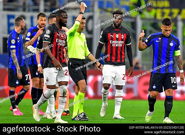 Milano, Italy. 16th, May 2023. Referee Clement Turpin books Lautaro Martinez (10) of Inter during the UEFA Champions League match between Inter and AC Milan at...