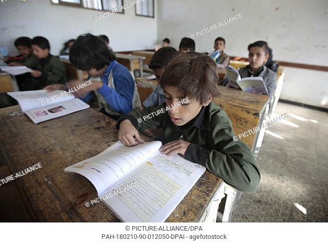 Yemeni students attend a class on the first day of the new semester at a school in Sanaa, Yemen, 10 February 2018. Approximately 2 million of the 7