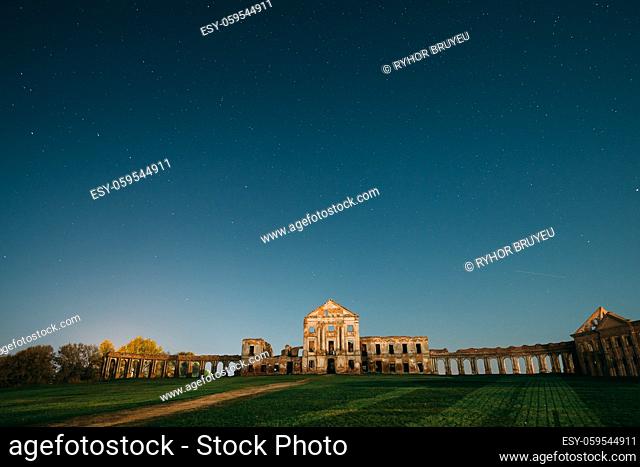 Ruzhany, Brest Region, Belarus. Night Starry Sky Above Ruzhany Palace. Famous Popular Historic Landmark Under Night Stars. Night View