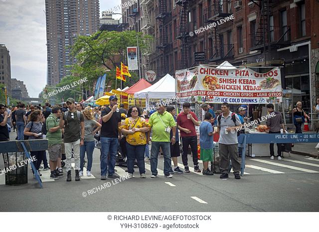 Crowds gorge themselves at the 45th Annual Ninth Avenue International Food Festival in New York on Sunday, May 20, 2018