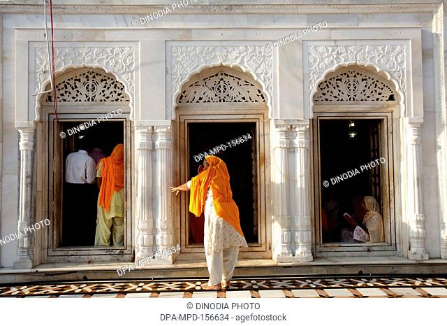 300th year of consecration of perpetual Guru Granth Sahib ; devotees at Sachkhand Saheb Gurudwara in Nanded ; Maharashtra ; India