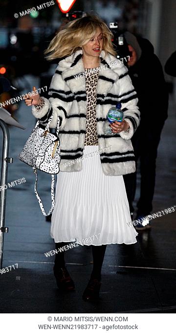 A make up free Fearne Cotton arrives at the BBC Radio 1 studios, wearing a stripped faux fur coat, a white pleated skirt and carrying white patterned handbag