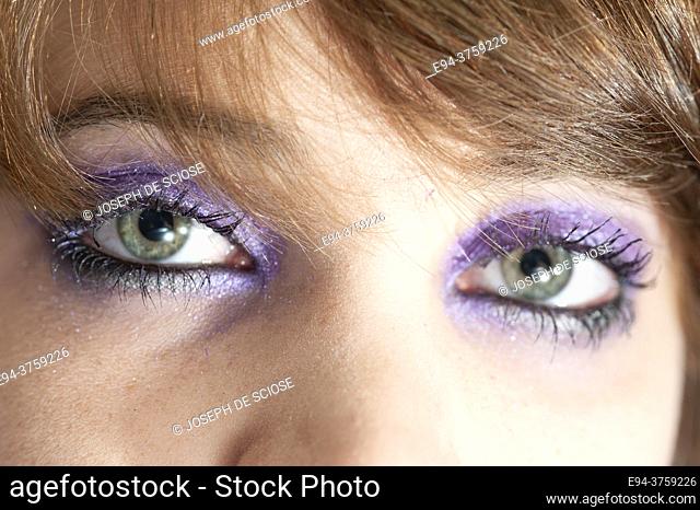 Close-up of eyes of and 18 year old brunette woman wearing