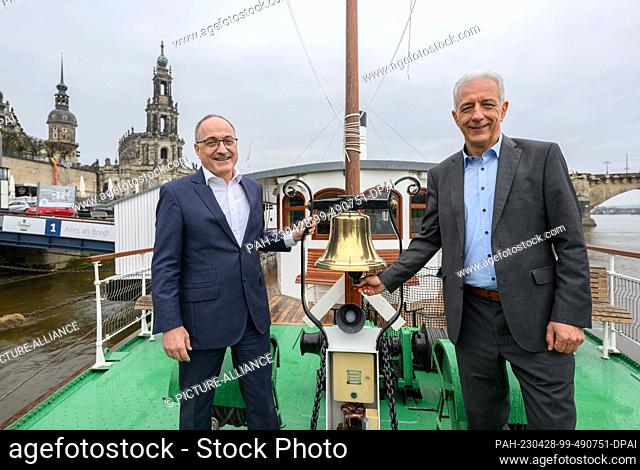 28 April 2023, Saxony, Dresden: Stanislaw Tillich (CDU, r), former Prime Minister of Saxony, and Robert Straubhaar, Managing Director of United Rivers AG from...