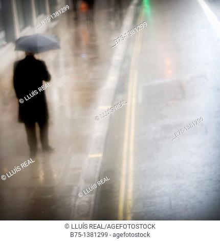 Man under the rain