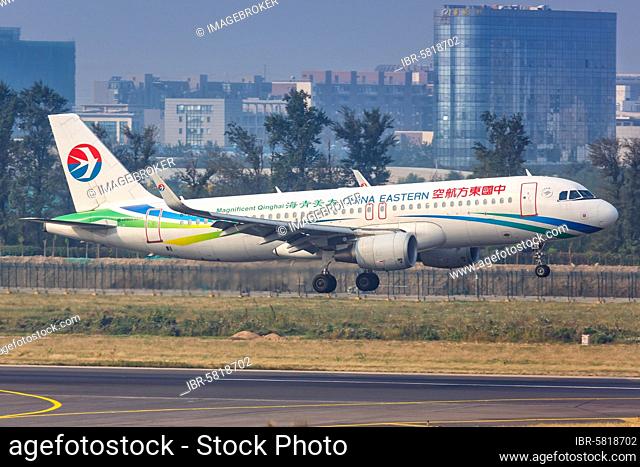 An Airbus A320 aircraft of China Eastern Airlines with registration number B-9942 at Beijing Airport (PEK), Beijing, China, Asia