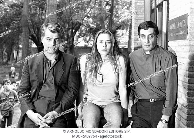 Italian actors Flavio Bucci, Michele Placido and Barbara De Rossi on the set of TV show La piovra. 14th September 1983