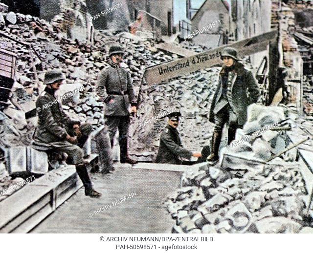 The contemporary colorized German propaganda photo shows German soldiers in a local command site, set up in the basement of a destroyed residential building