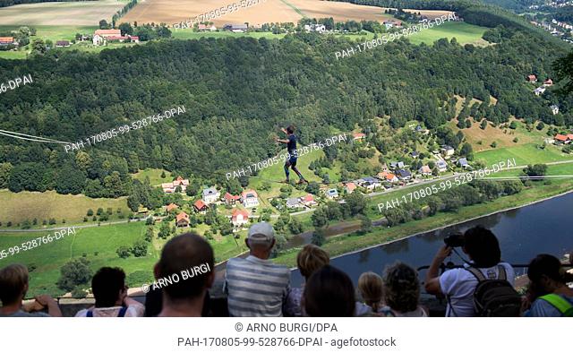 The slackliner from Dresden, Kai G., walking with his eyes covered along the new 65-meter long highline, 240 meters above ground