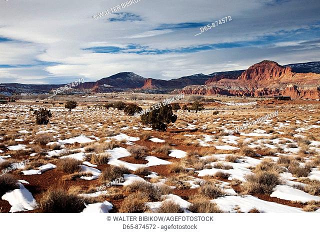 Small ranch house and Waterpocket Fold of the Capitol Reef National Park in winter, Torrey, Utah, USA