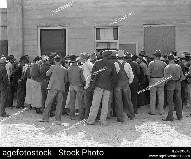 Waiting for relief checks, Calipatria, California, 1937. Creator: Dorothea Lange