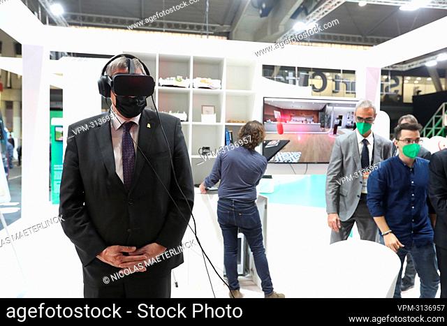 Flemish Minister President Jan Jambon wears VR Virtual Reality glasses during a visit to the Smart City Expo World Congress, in Barcelona, Catalonia