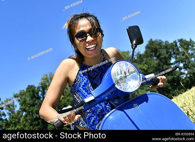 Woman with sunglasses sits on Vespa PX, rides on Vespa, laughs and has fun, Vespa PX 200, P 200 X, V8X 1T, V8X1T, 200ccm, year of construction, 1991, moped