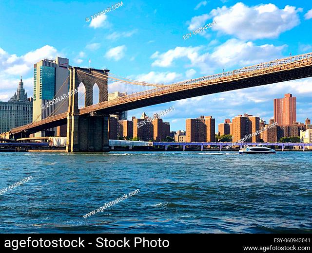 Brooklyn Bridge and Manhattan skyline, New York City downtown. New York City panoramic view of Brooklyn Bridge with Hudson river. October 22nd, 2020