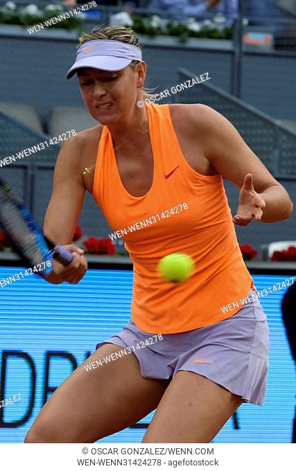 Maria Sharapova of Russia in action against Eugenie Bouchard of Canada on day three of the Mutua Madrid Open tennis at La Caja Magica in Madrid, Spain