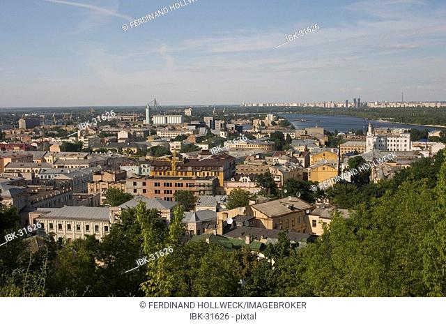Ukraine Kiev district of Podil historical downtown green trees blue sky with clouds 2004