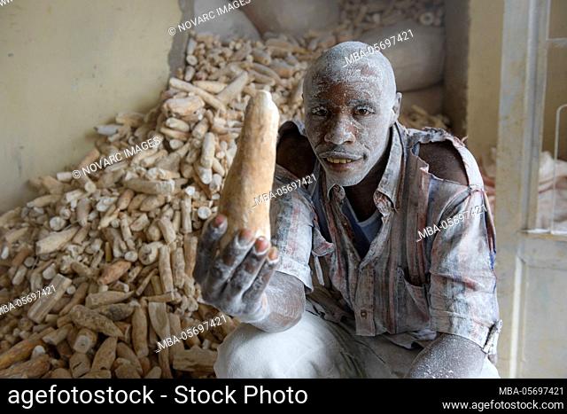 Workers making cassava, Burundi, Africa