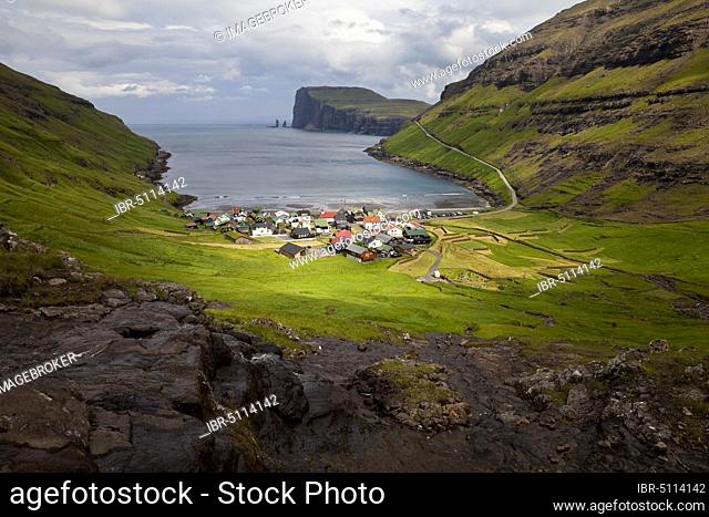 The small village of Tjørnuvik with view of the Atlantic Ocean, Streymoy, Faroe Islands, Føroyar, Denmark, Europe