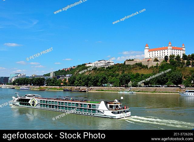 Passenger ship on the Danube in front of the castle castle in the Slovak capital Bratislava - Slovakia